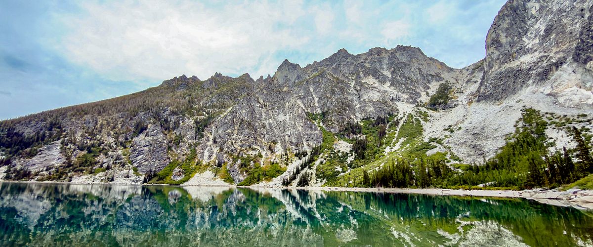 Granite peaks reflected in Colchuck Lake